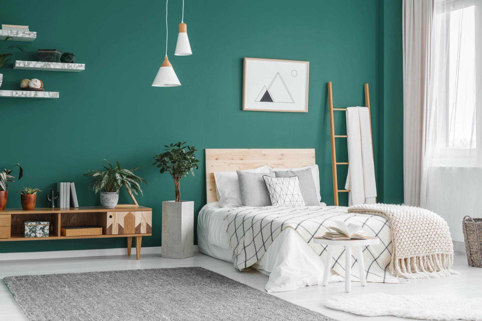 Bedroom with green feature-wall