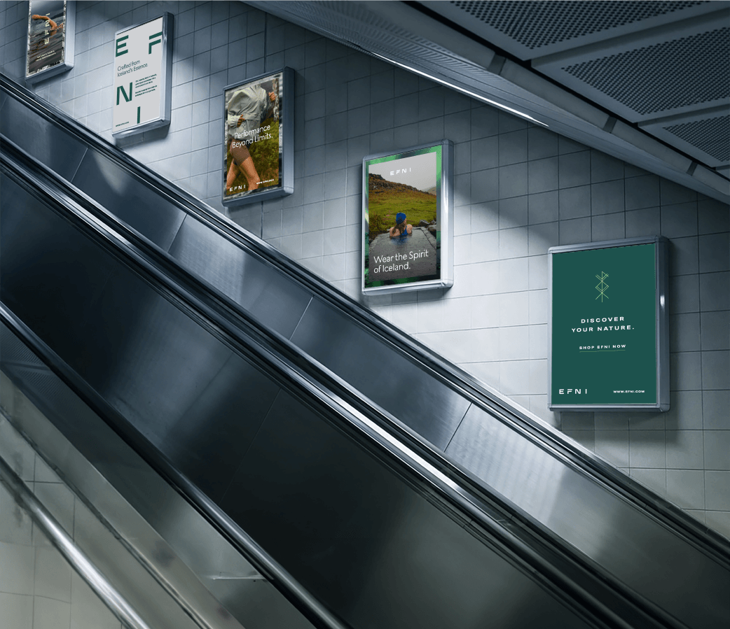 An illustration of Efni out-of-home ads along the side of an escalator