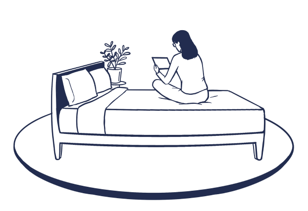 Dark blue line drawing of a female using her tablet device on her bed