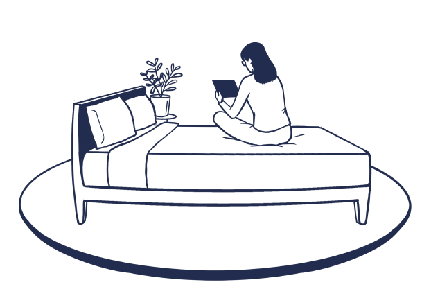 Dark blue line drawing of a female using her tablet device on her bed