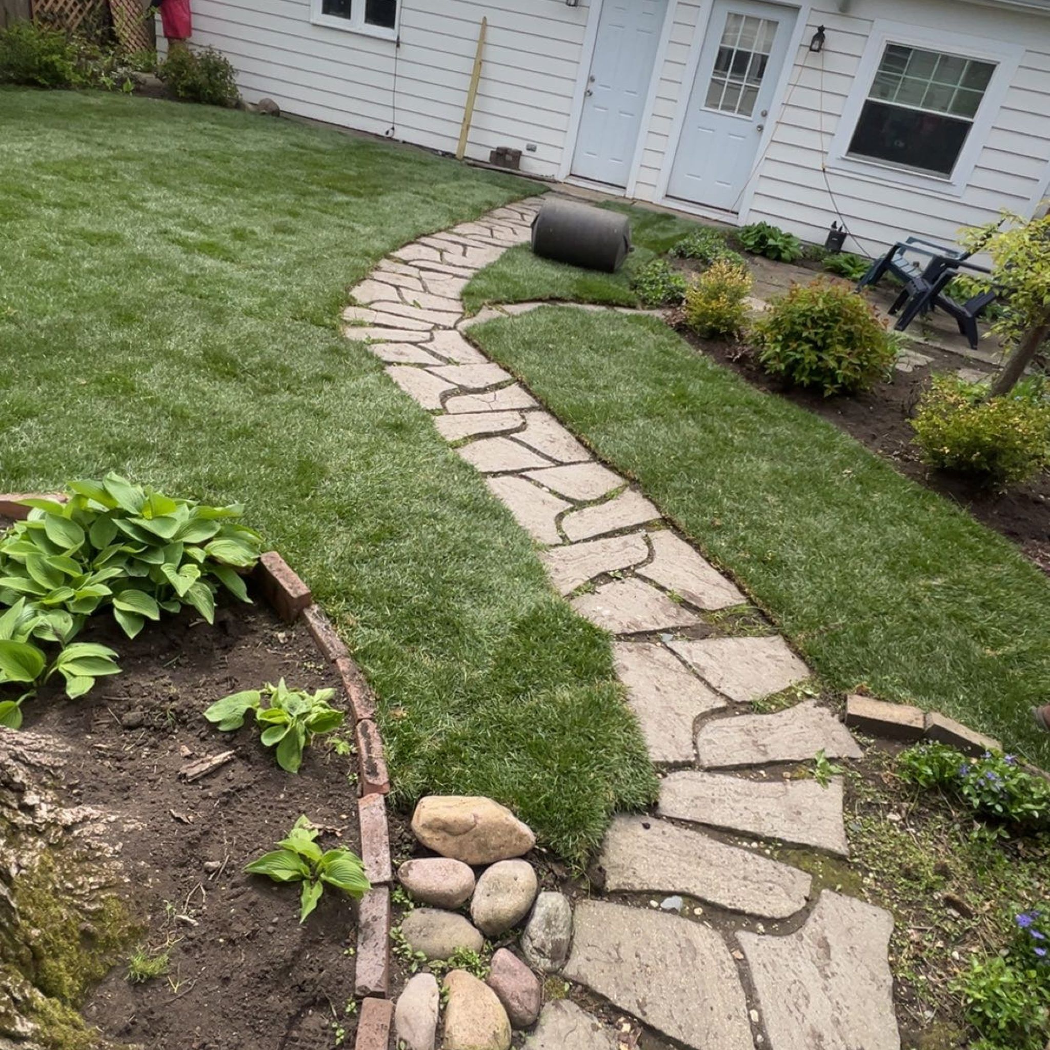 Fresh sod lawn with a custom flagstone walkway, North Shore Chicago