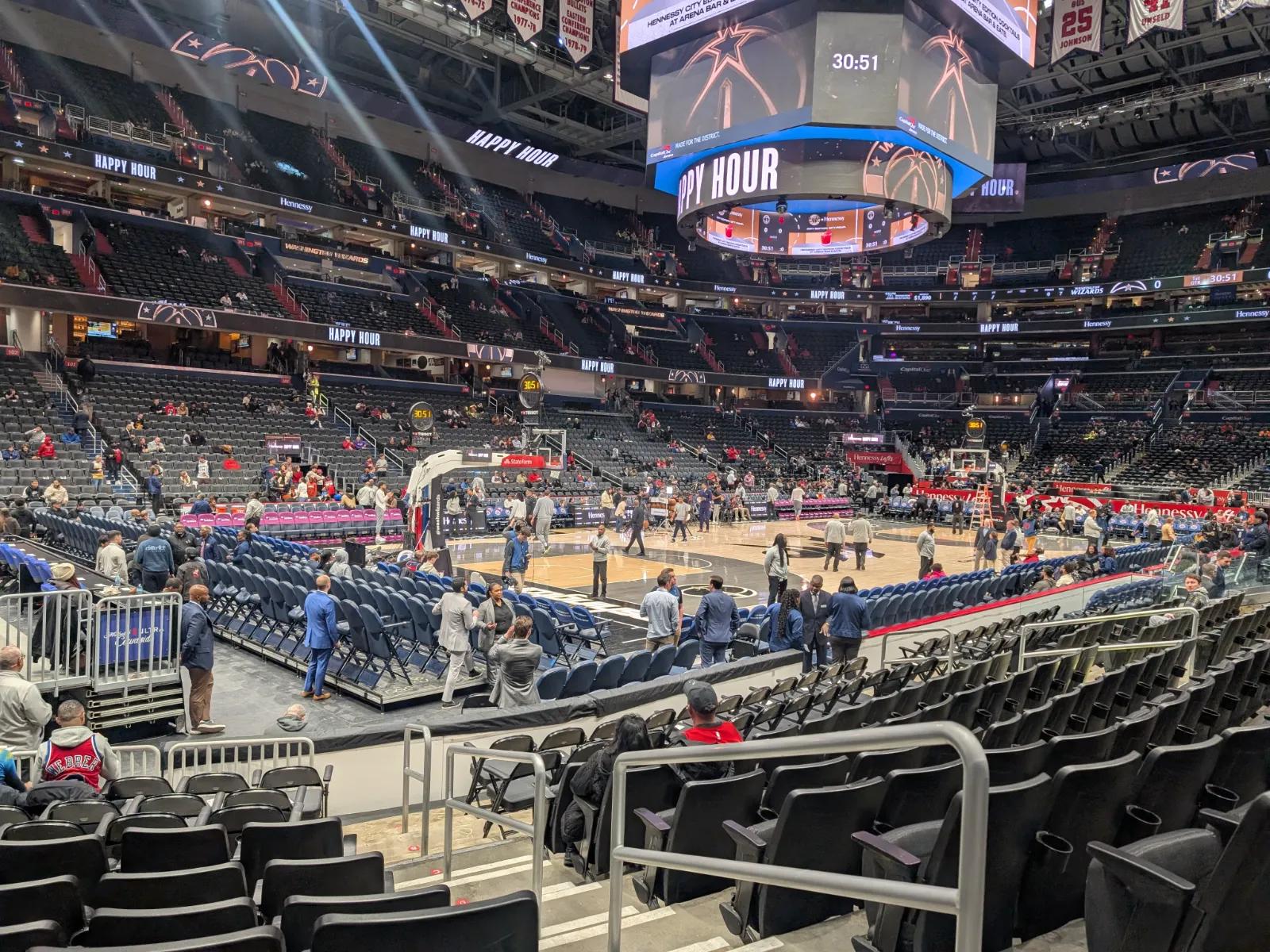 Pre-game warmups at Capital One Arena in D.C. before the Wizards game. Empty seats and a clear view of the court.