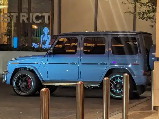 Light blue Mercedes G-Wagon parked outside the Mandalay Bay district near Michelob Ultra Arena in Las Vegas.