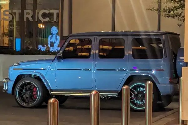 Light blue Mercedes G-Wagon parked outside the Mandalay Bay district near Michelob Ultra Arena in Las Vegas.
