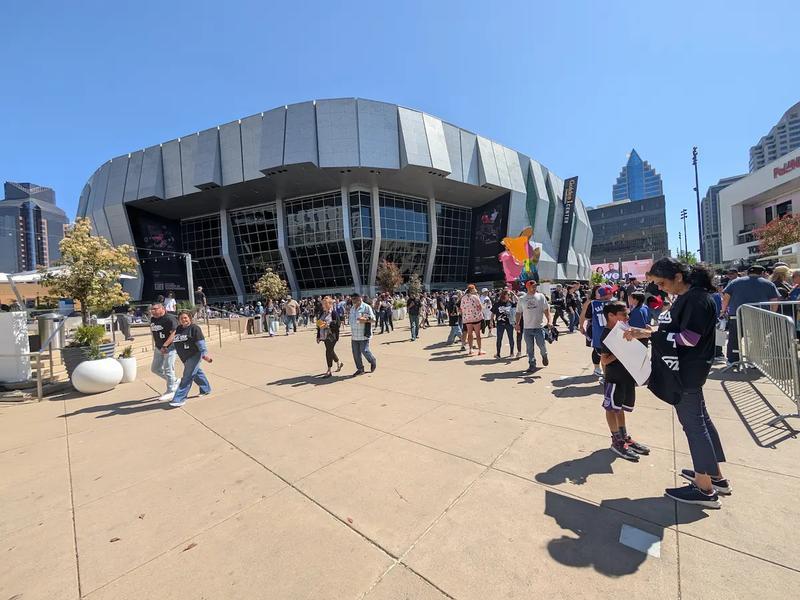 Crowds gathering outside the Golden 1 Center in Sacramento before a game.