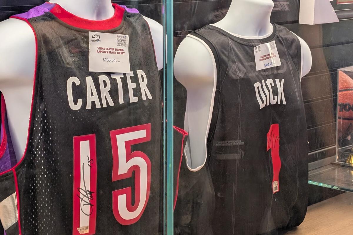 Signed Vince Carter and Gradey Dick jerseys for sale in a display case at Scotiabank Arena in Toronto.