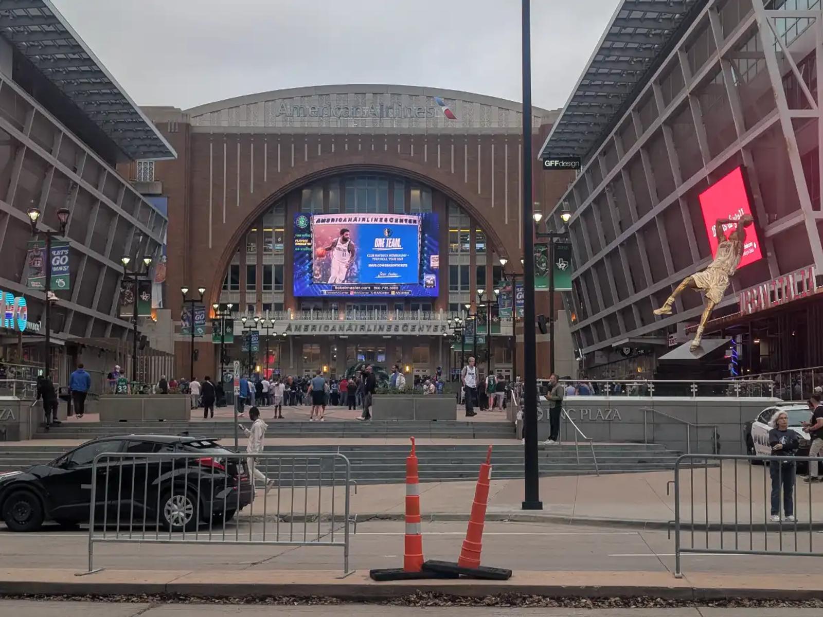 The plaza outside American Airlines Center in Dallas, complete with the Dirk Nowitzki statue and game day crowds.