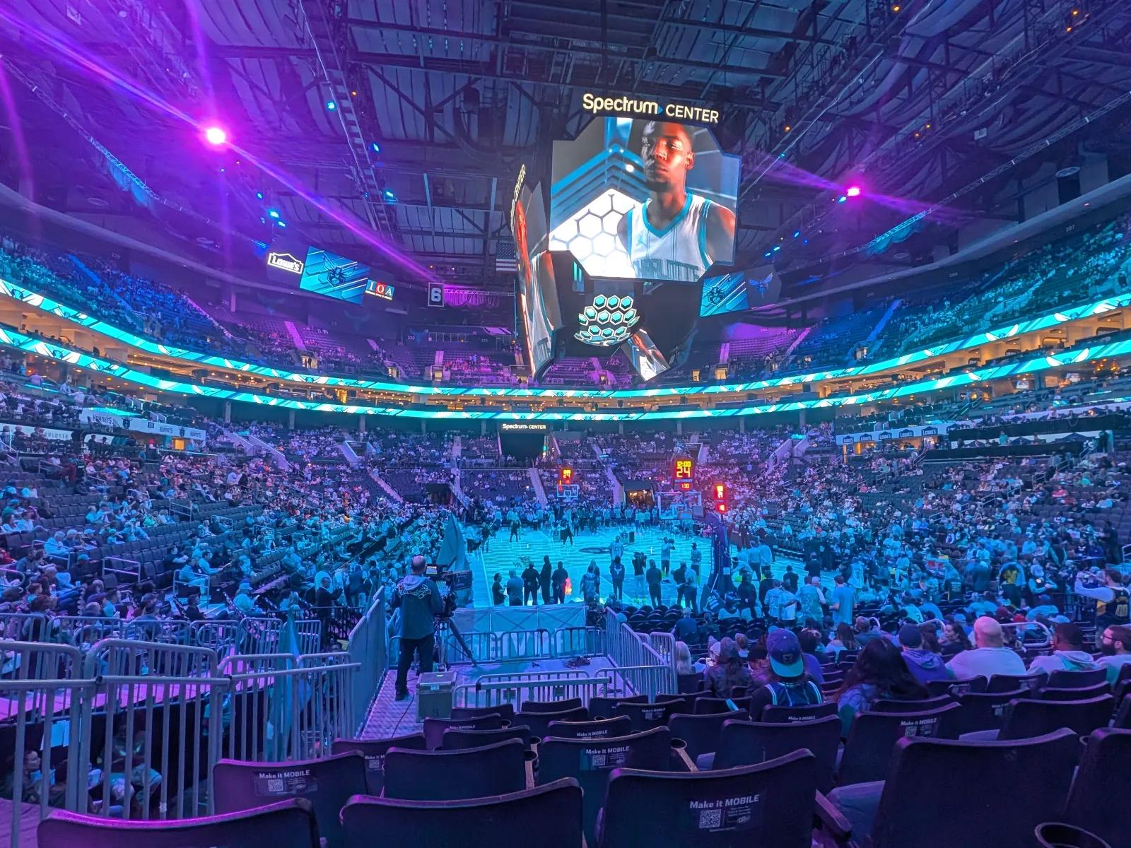 View from our seats at Spectrum Center in Charlotte before the Hornets game. The jumbotron is showing a player.