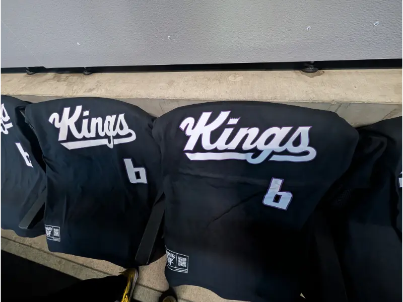 Black Kings t-shirts draped over seats at Golden 1 Center in Sacramento.