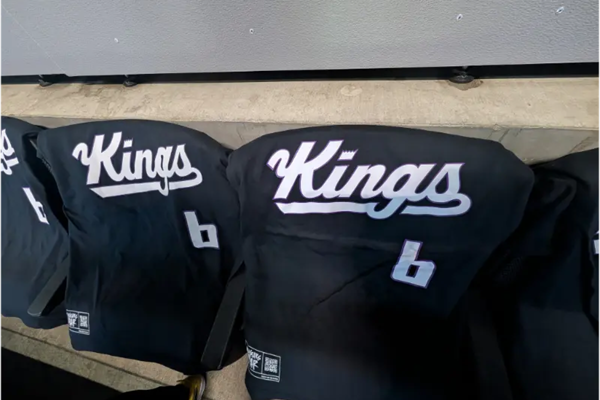 Black Kings t-shirts draped over seats at Golden 1 Center in Sacramento.
