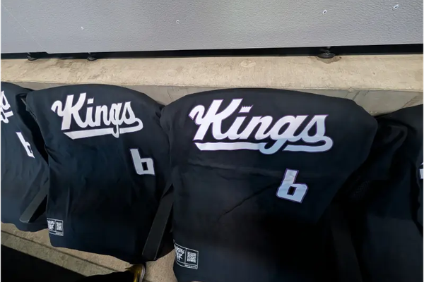 Black Kings t-shirts draped over seats at Golden 1 Center in Sacramento.