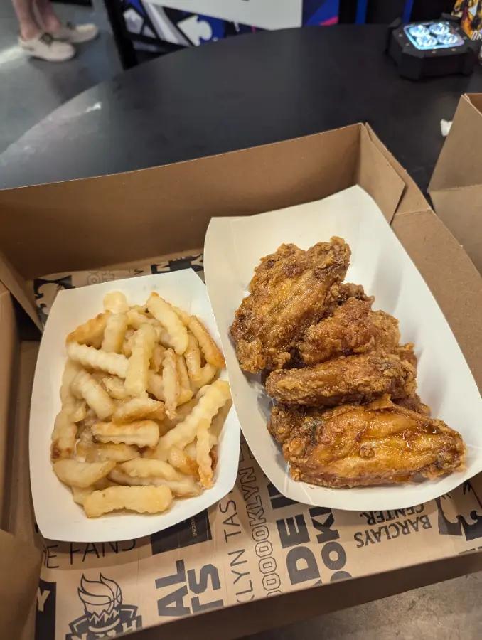 Chicken wings and Crinkle-cut fries