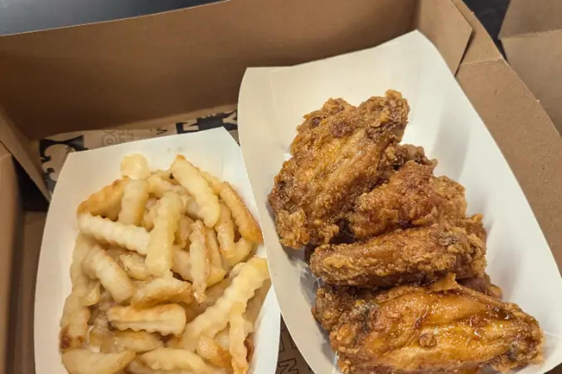 Chicken wings and Crinkle-cut fries