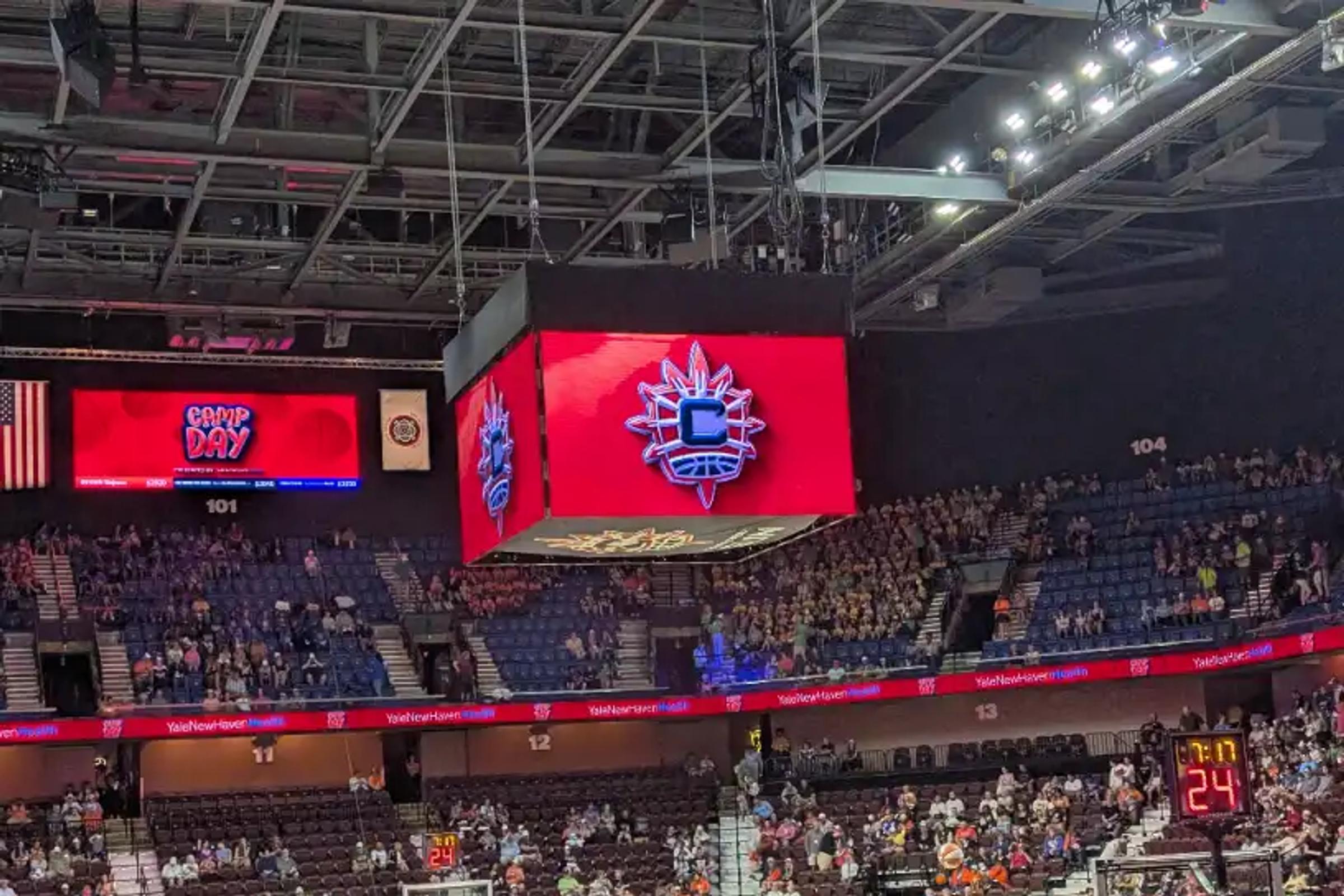The Connecticut Sun logo on the jumbotron at Mohegan Sun Arena during a Camp Day game.