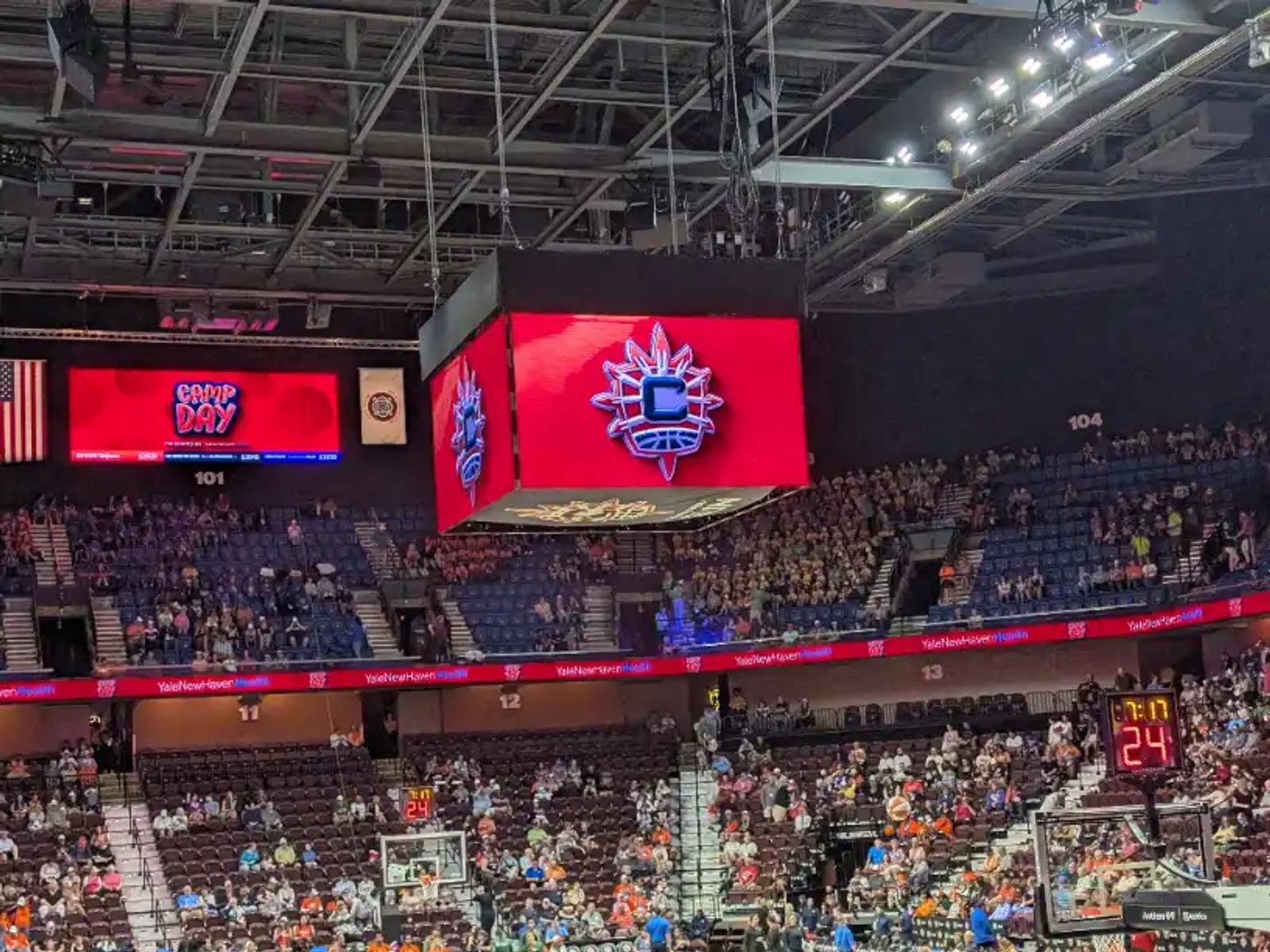 The Connecticut Sun logo on the jumbotron at Mohegan Sun Arena during a Camp Day game.