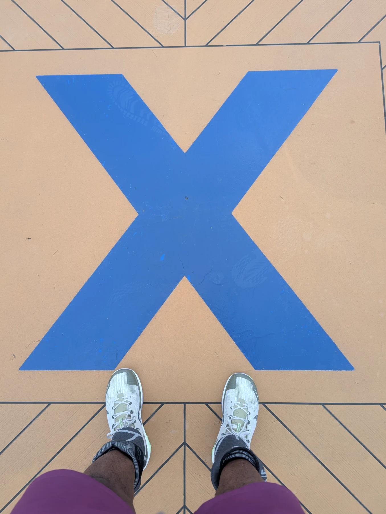 Standing on the blue X deck marker during a speed test on the Celebrity Silhouette.