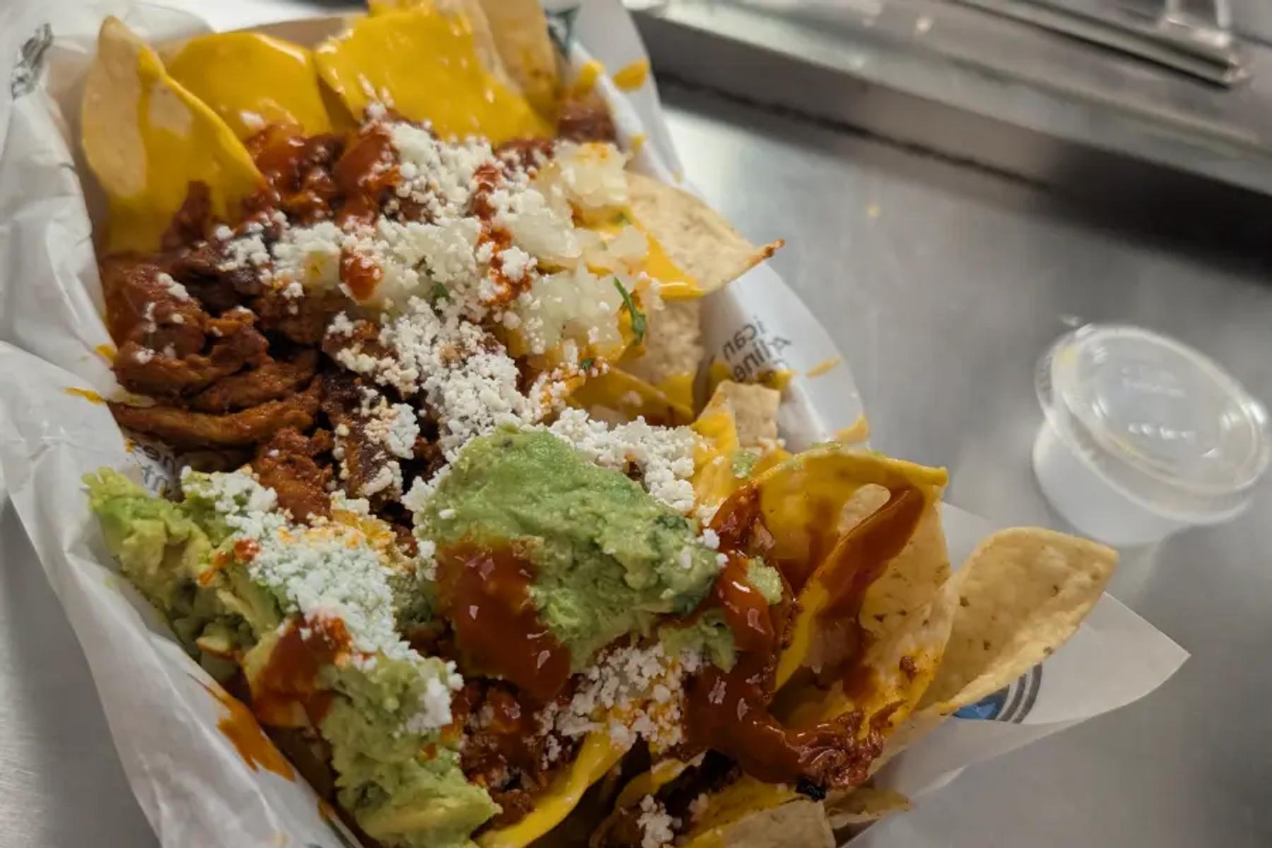Loaded nachos with carne asada