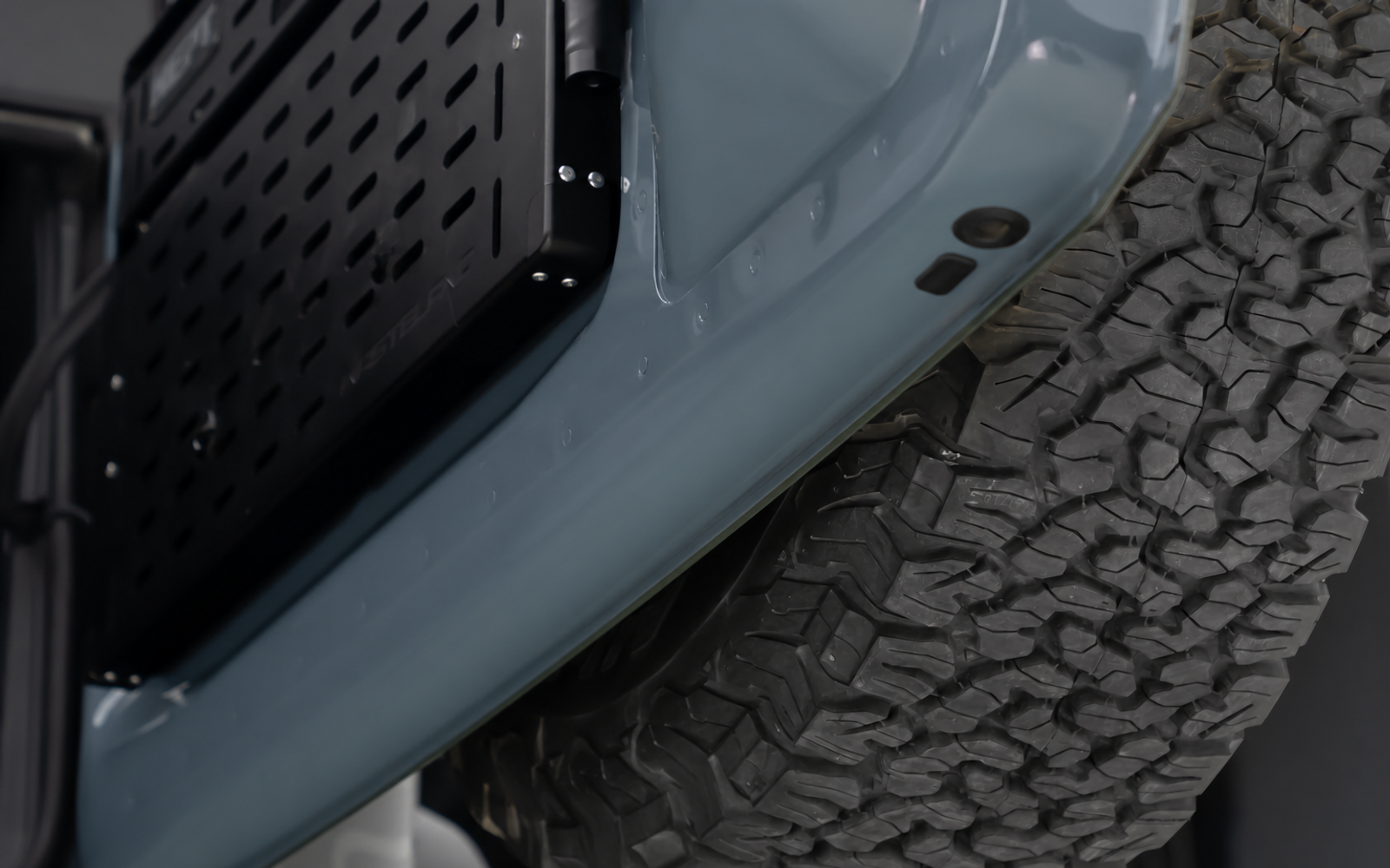 The tailgate swings its full arc. In a tight spot it finds whatever is parked behind you.