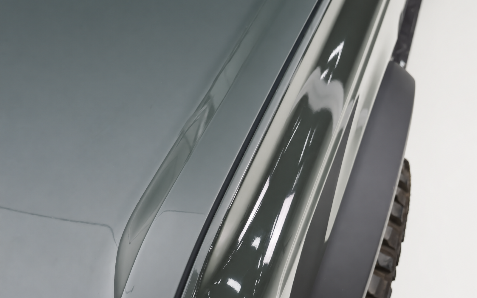 Nothing on the hood corner. A branch that clears the bumper arrives at windscreen height.