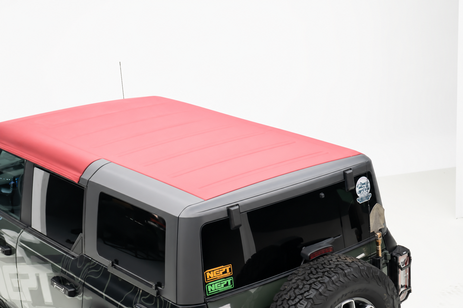 Bare rear roof. A rack that runs the whole roof fouls a soft top that has to fold back over it.