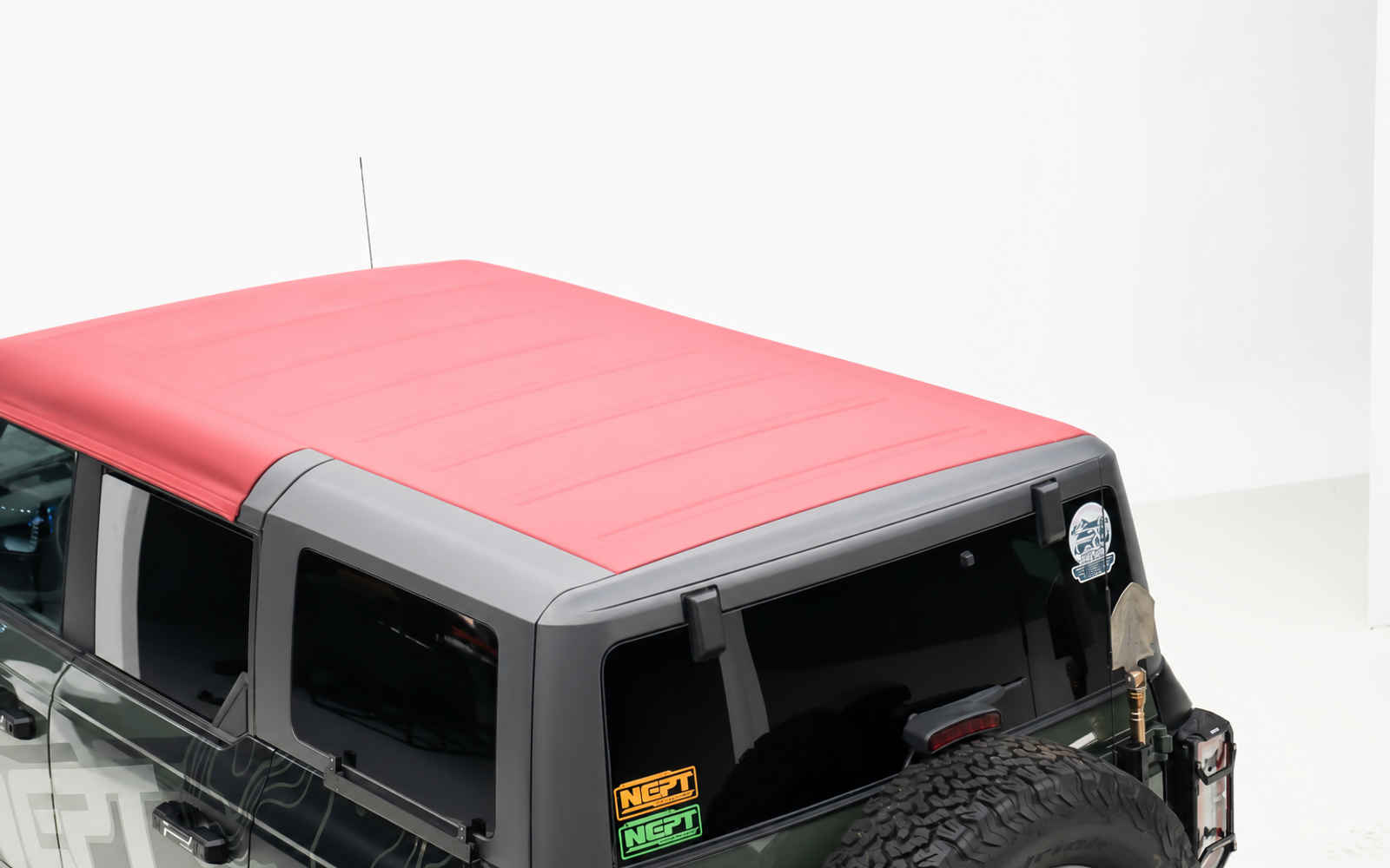 Bare rear roof. A rack that runs the whole roof fouls a soft top that has to fold back over it.