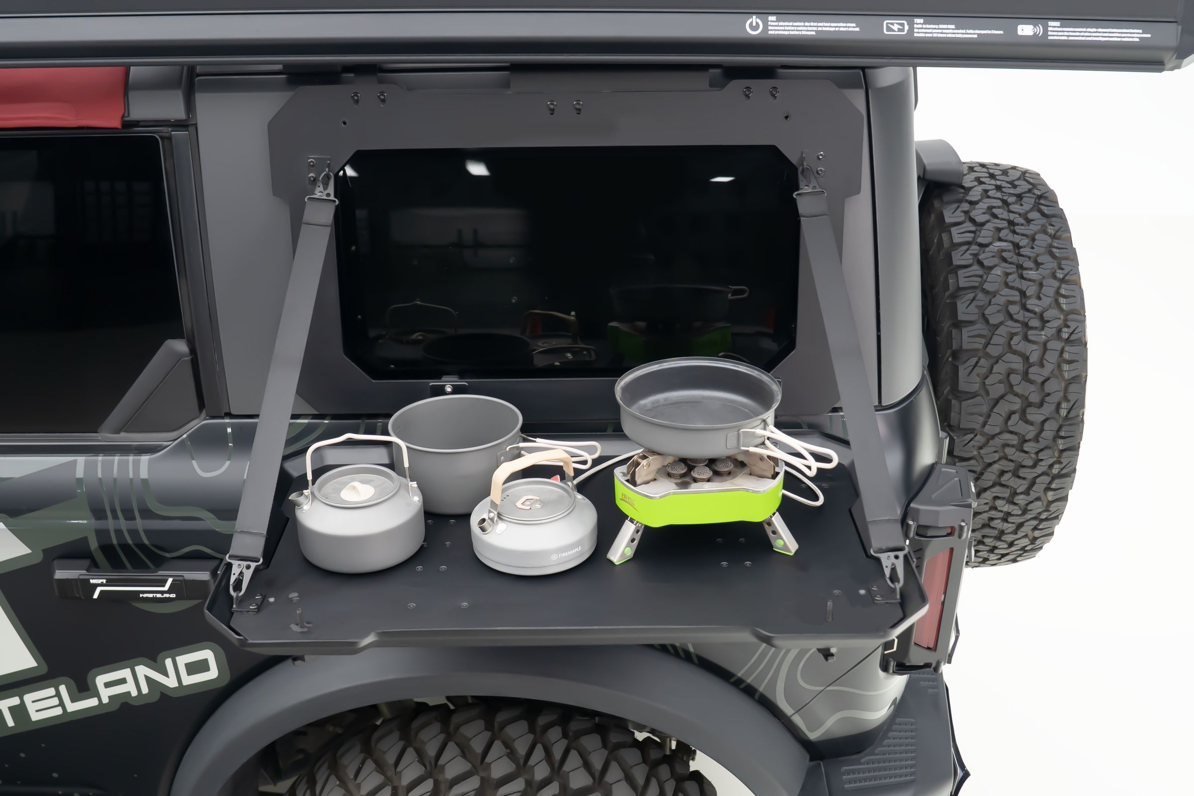 A panel with a table that folds off it. Most gear hangs straight onto the slots.