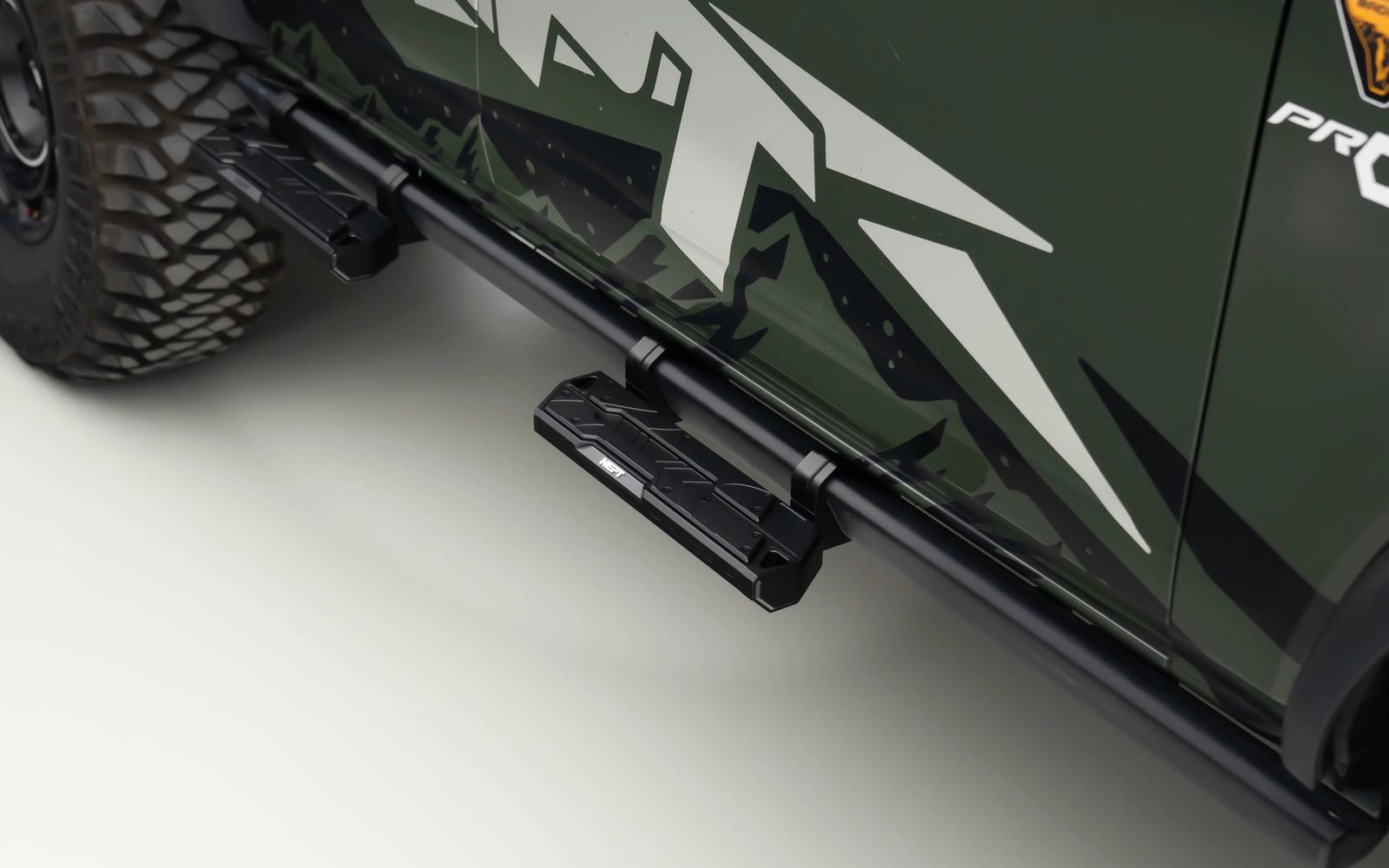 A step on the rail's own bolt points. Nothing drilled, and each one takes 300 kg.