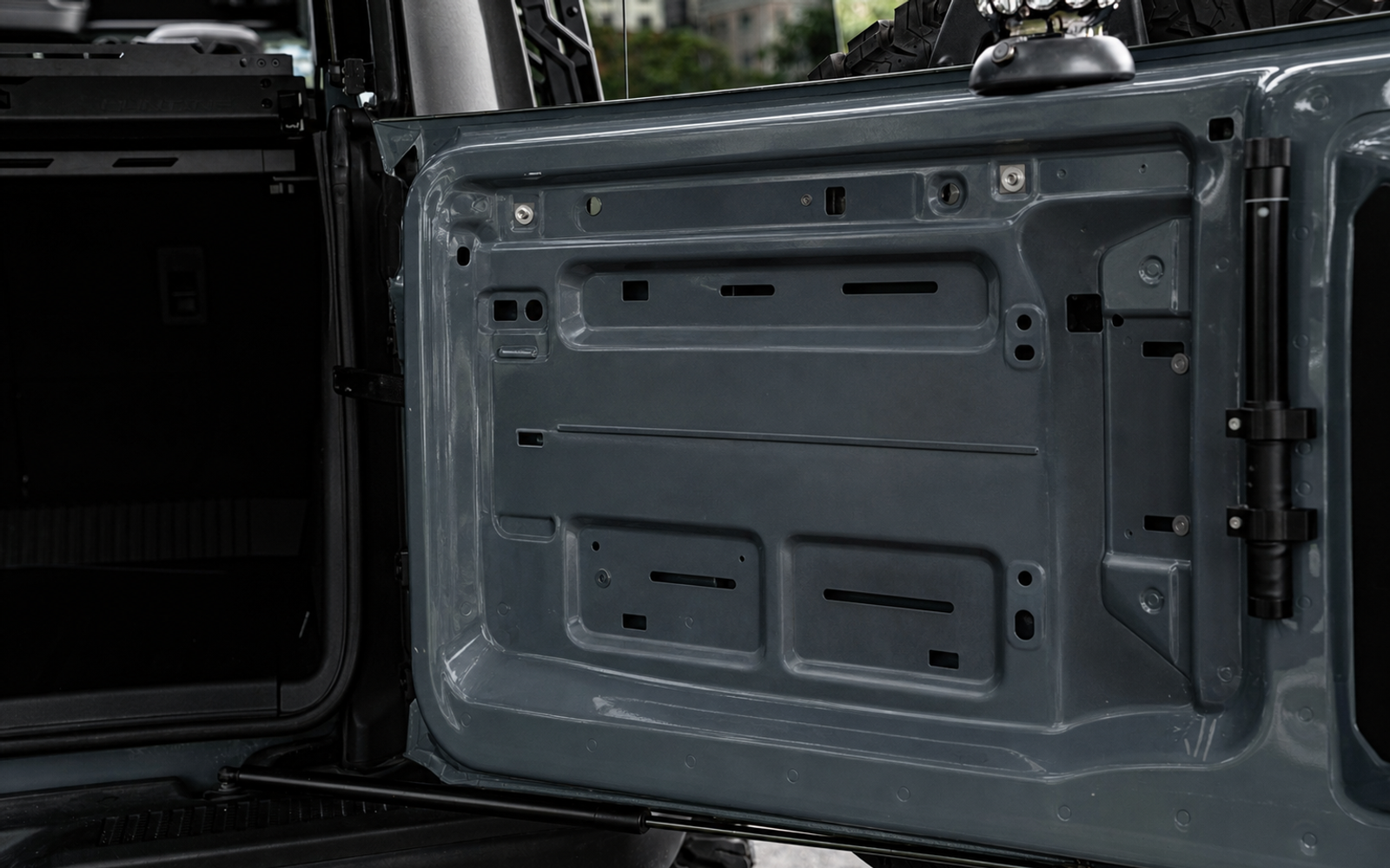 Tailgate down, nothing on it. You cook wherever you can balance a pan.