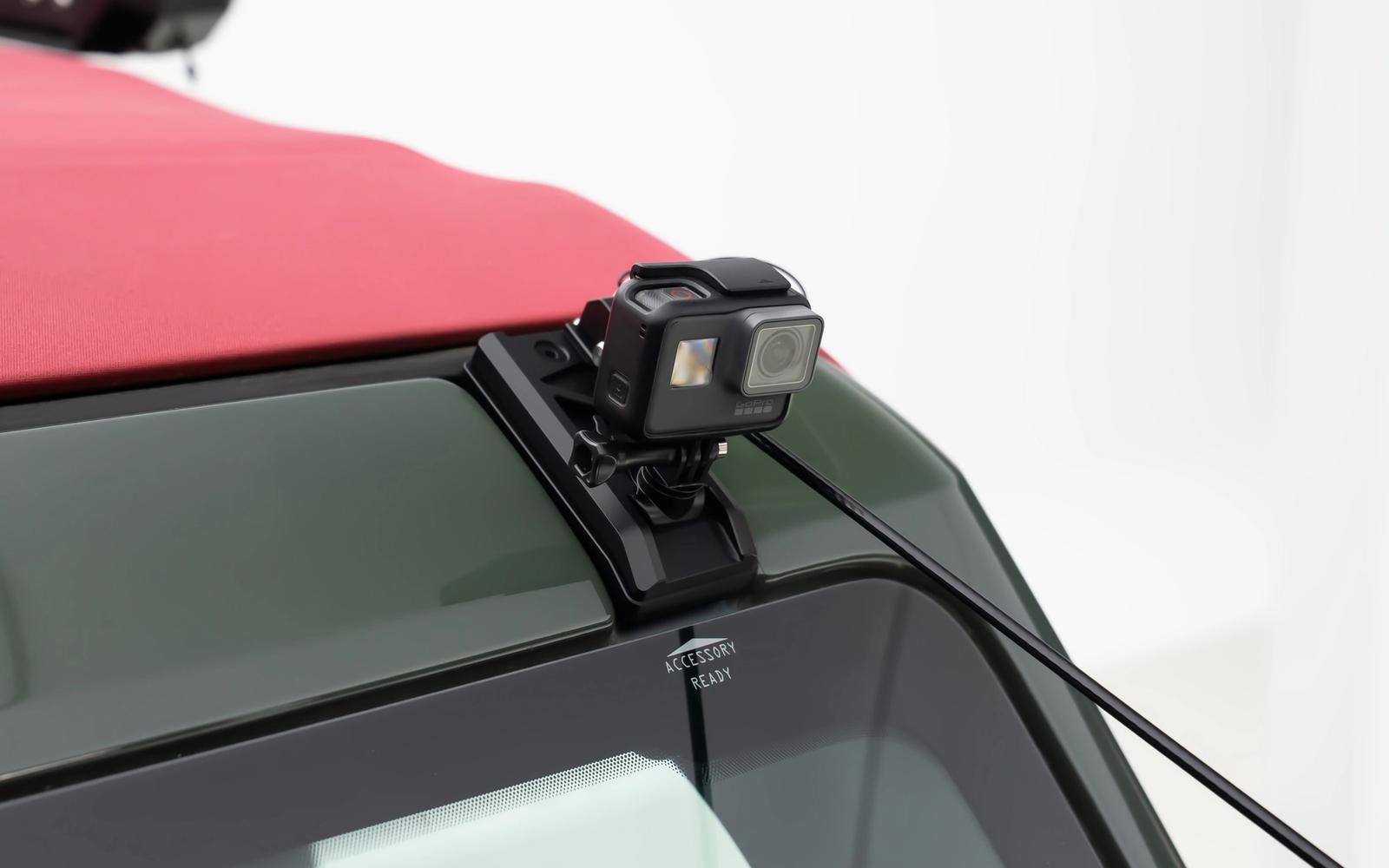 That top end, anchored to the roof. The hood still opens with the lines on.