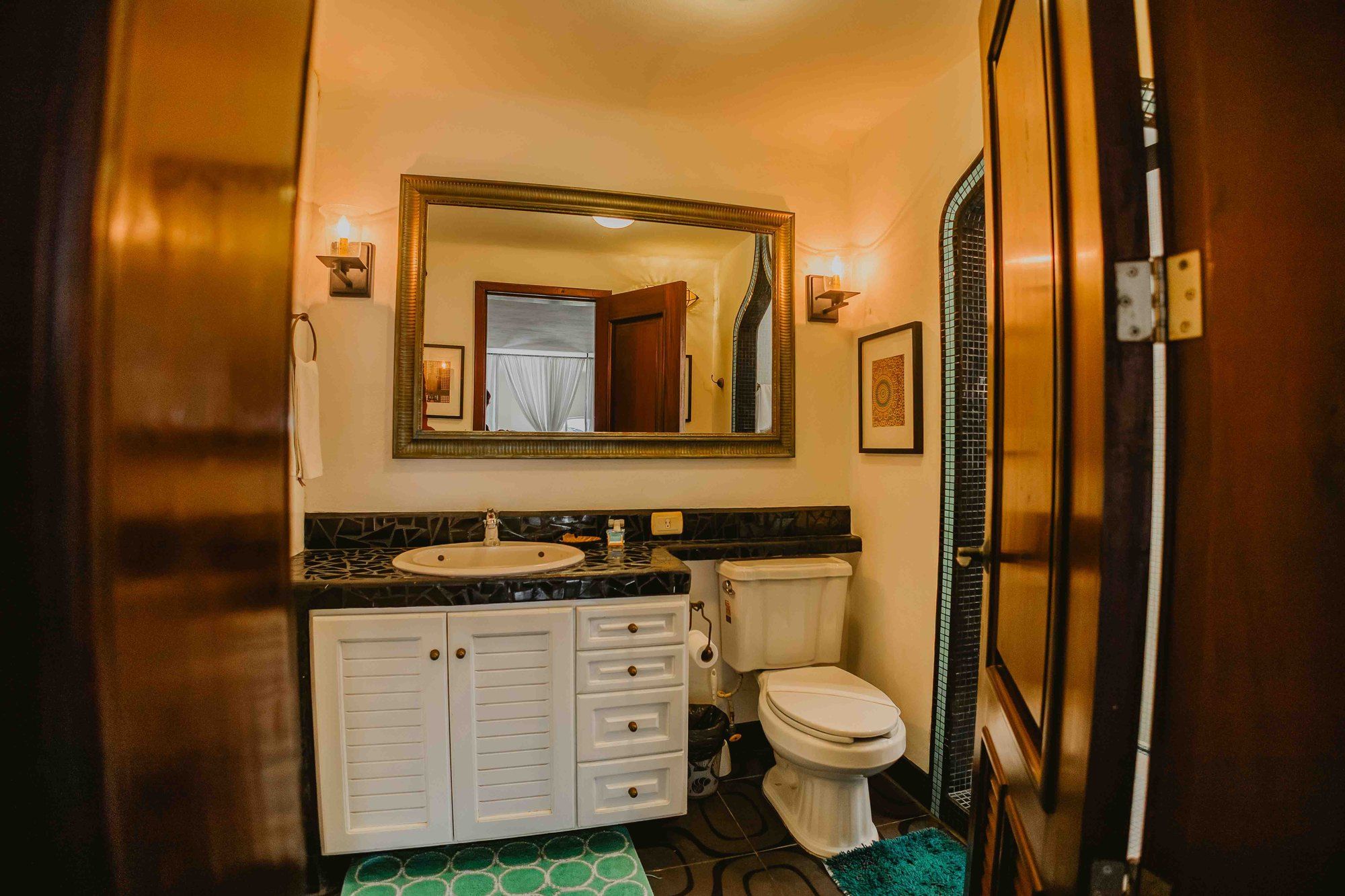 Bathroom with a wide vanity and toilet