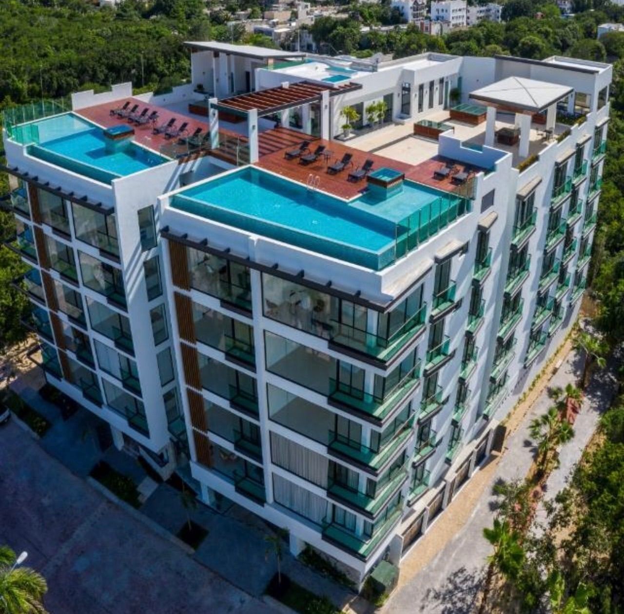Aerial view of the rooftop infinity pools at Playa Aurora 205