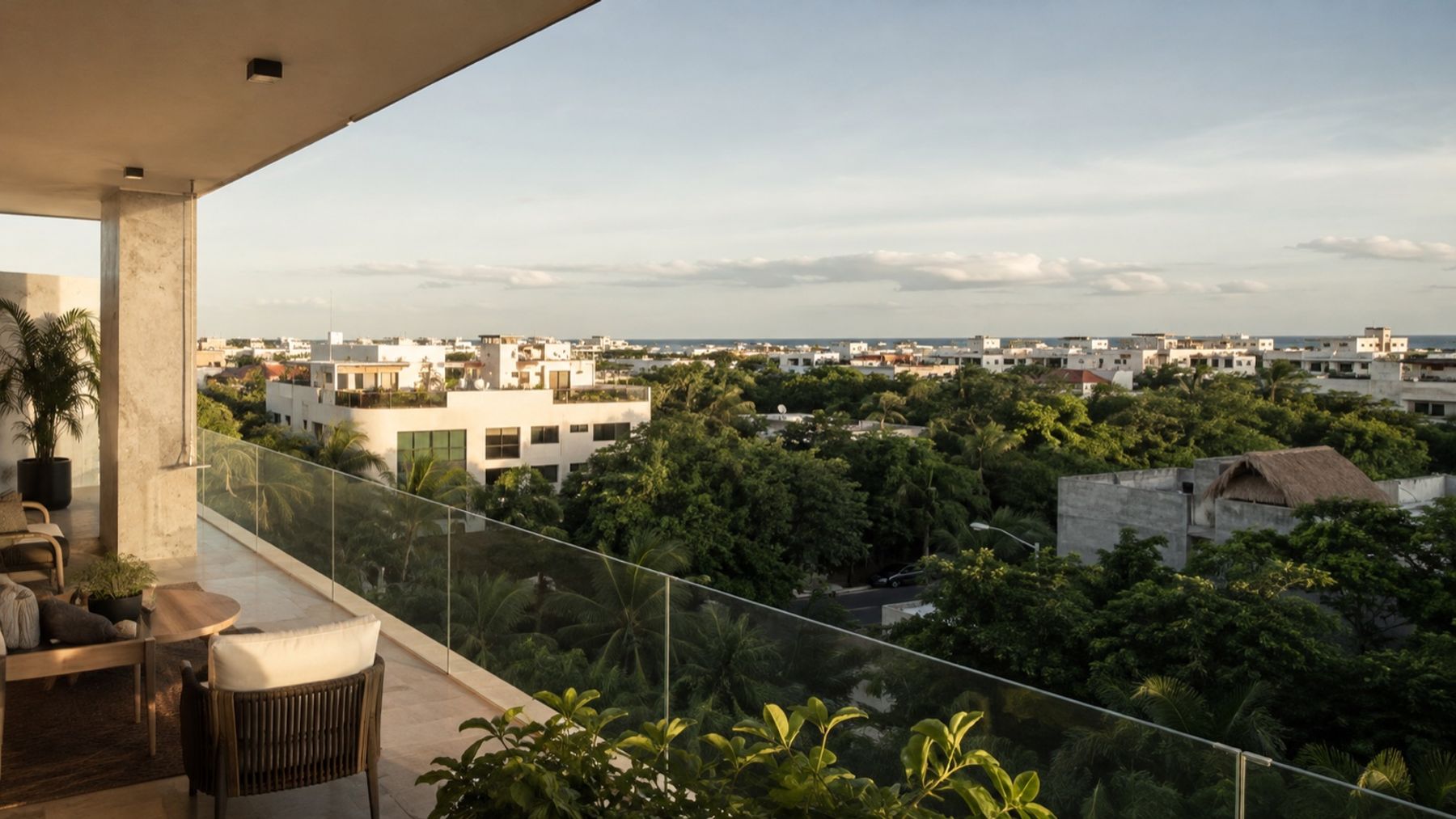 View from a contemporary terrace over Playa del Carmen toward the Caribbean Sea