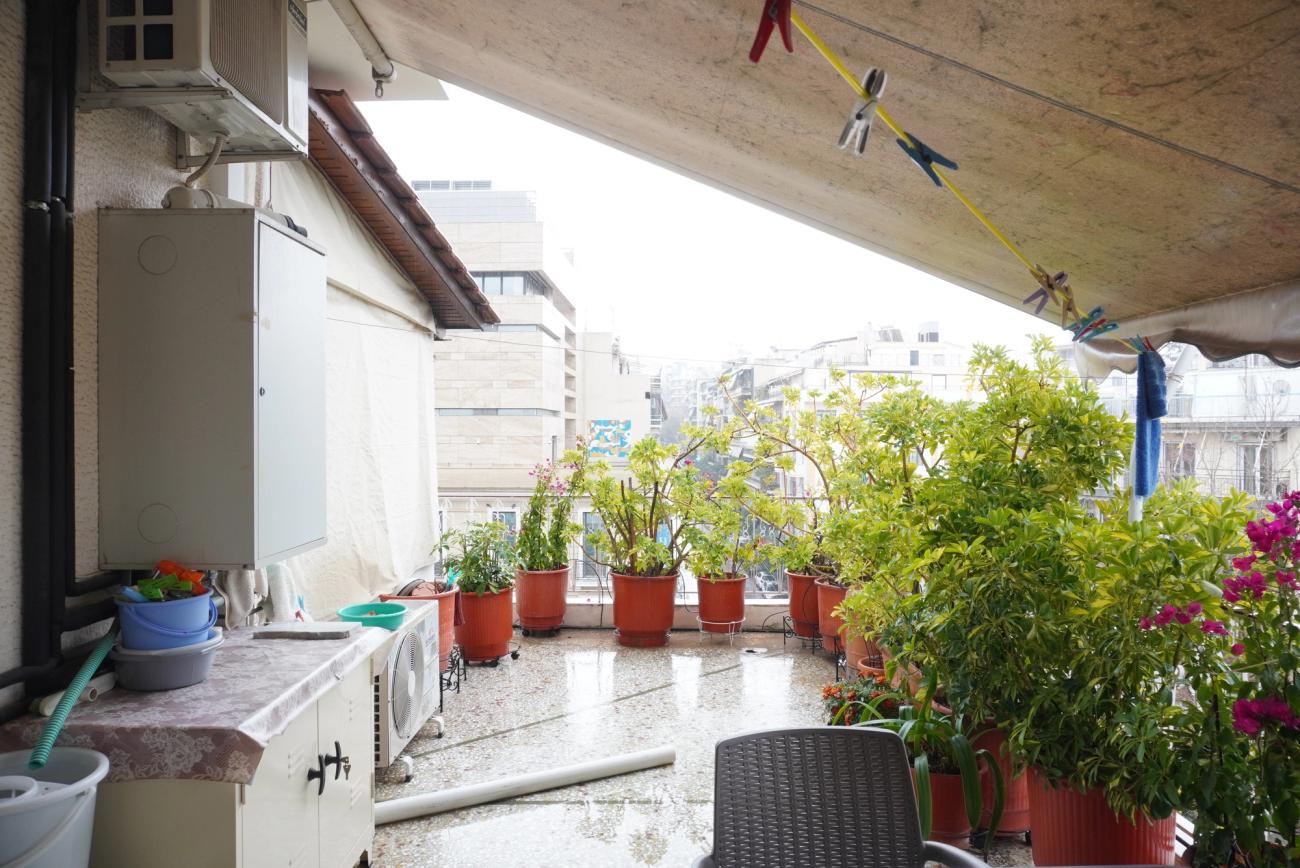 Despite the enclosure, the terrace remains spacious and continues to support everyday outdoor activities.