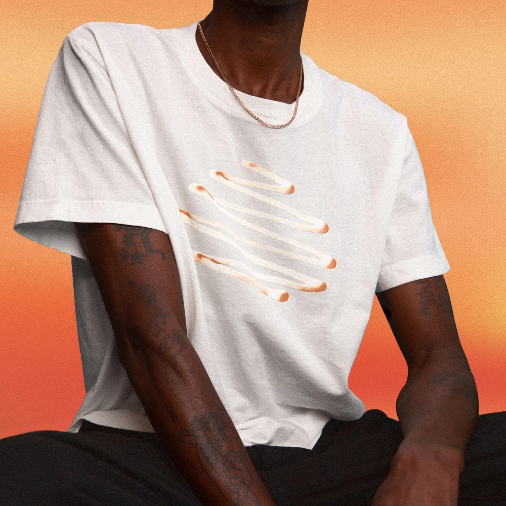 Male model wearing Squiggle Tee.