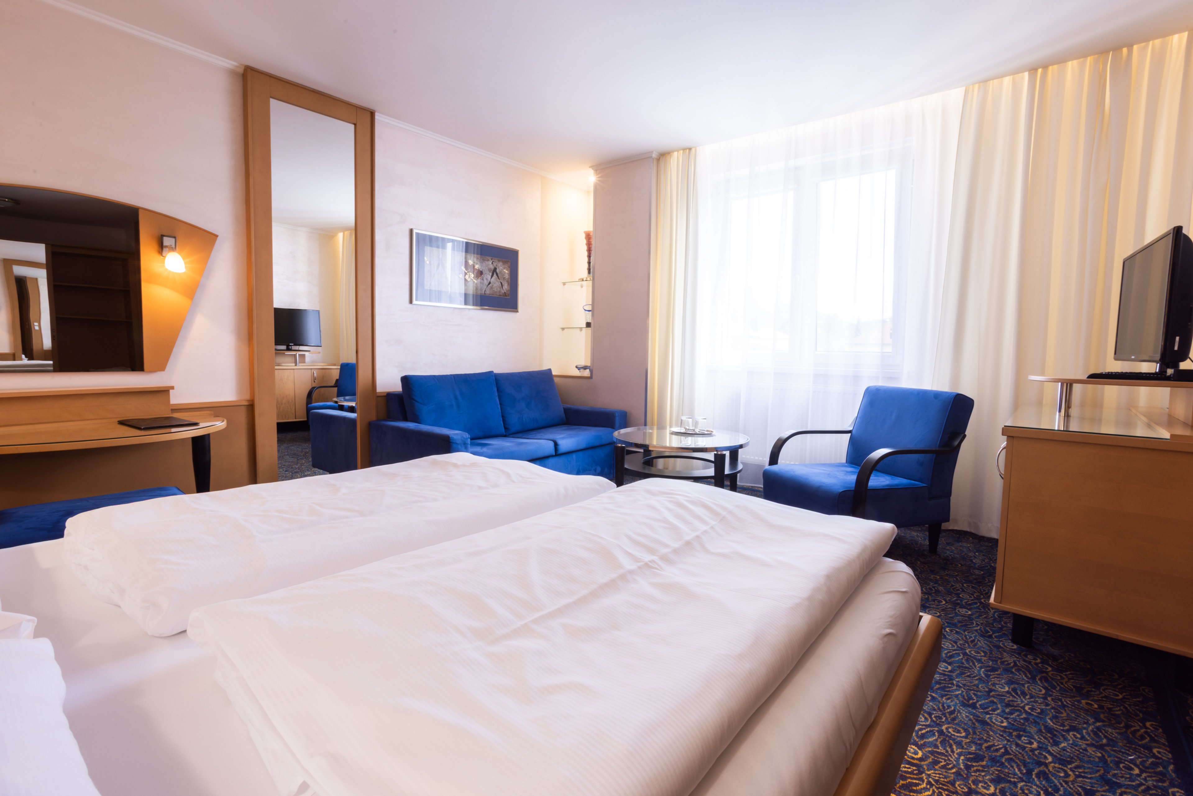 Apartmán Malý — ložnice v modré variantě