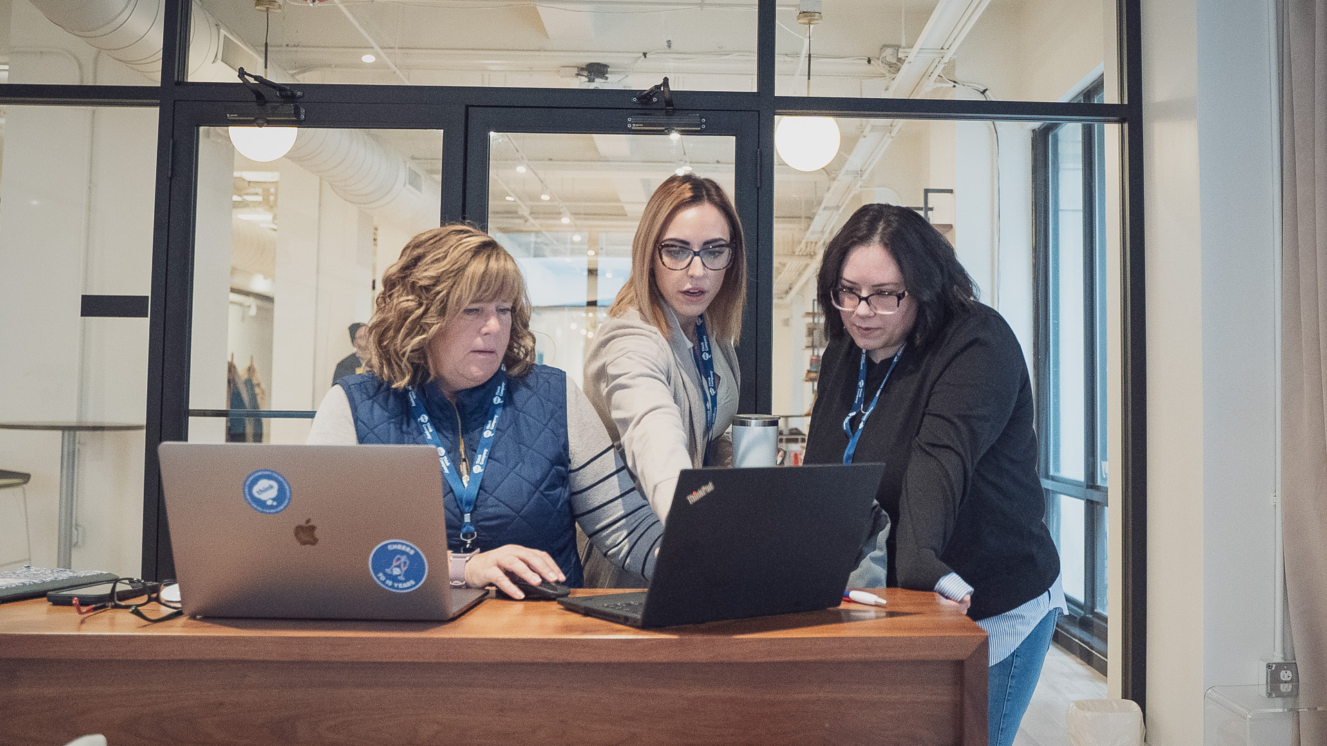 Insurance leaders and UX designers working on accessibility components