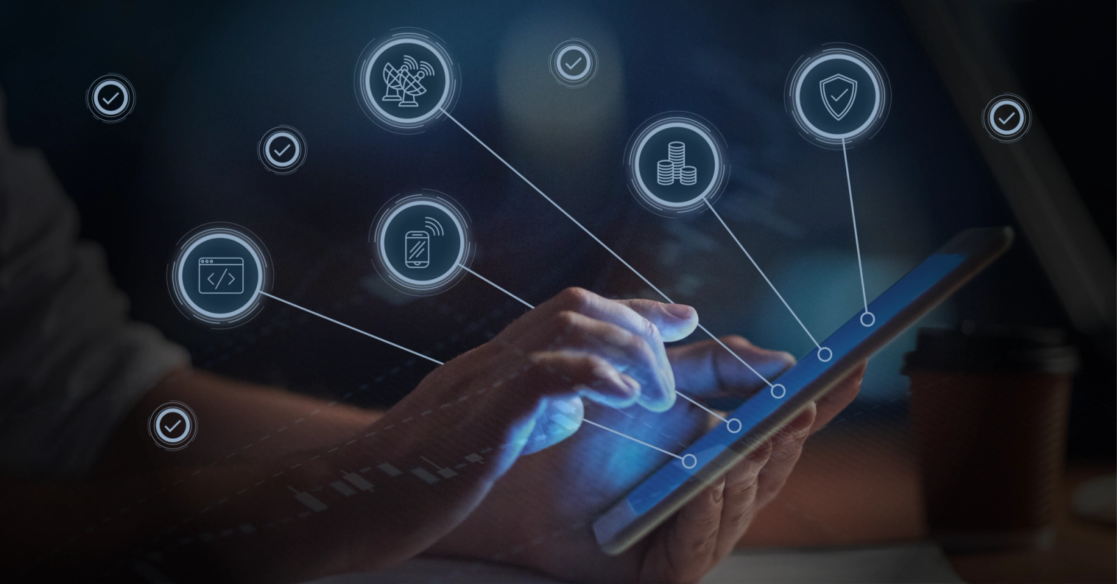Person’s hand using a mobile phone with icons stemming from screen in a web format