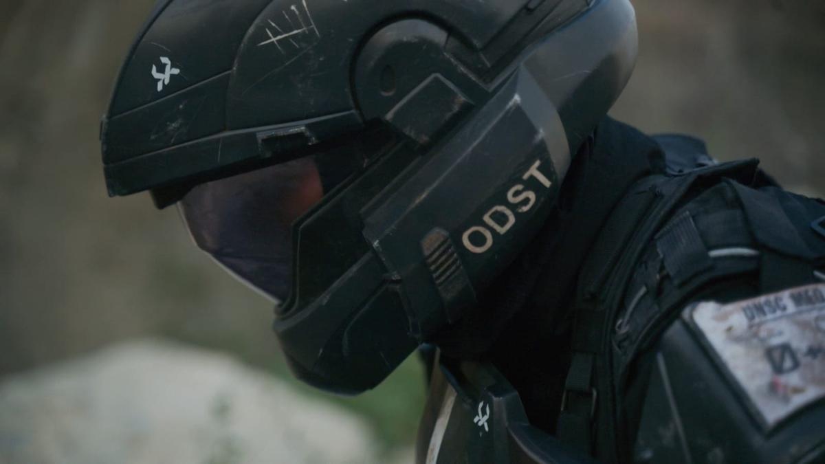 A screenshot from "Atonement" featuring an ODST soldier's head. The Atonement symbol is visible on their helmet.