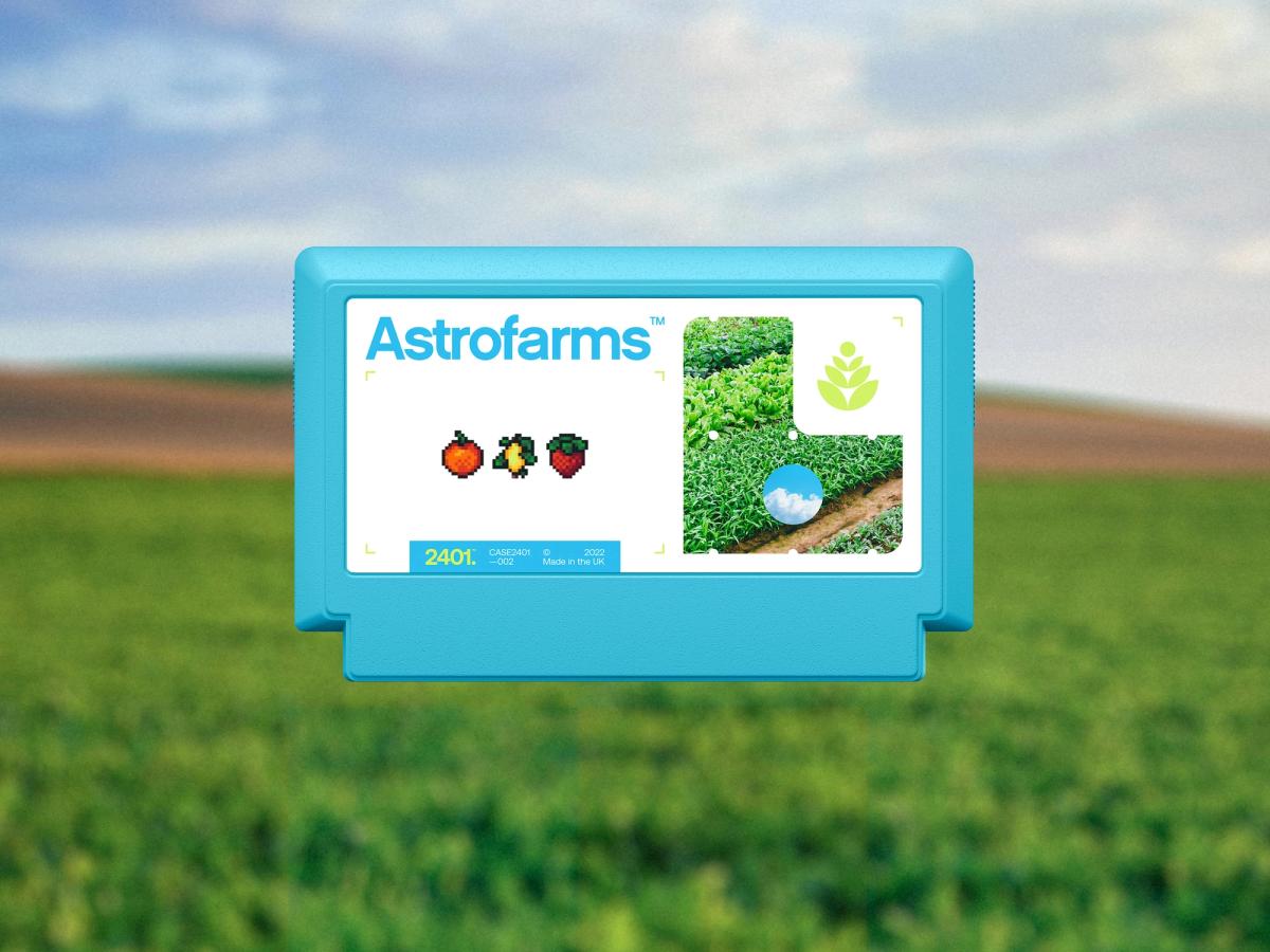 Turquoise Famicom game cartridge for “Astrofarms,” combining pixel-art fruit, crop photography and a modernist plant logo against blurred farmland.