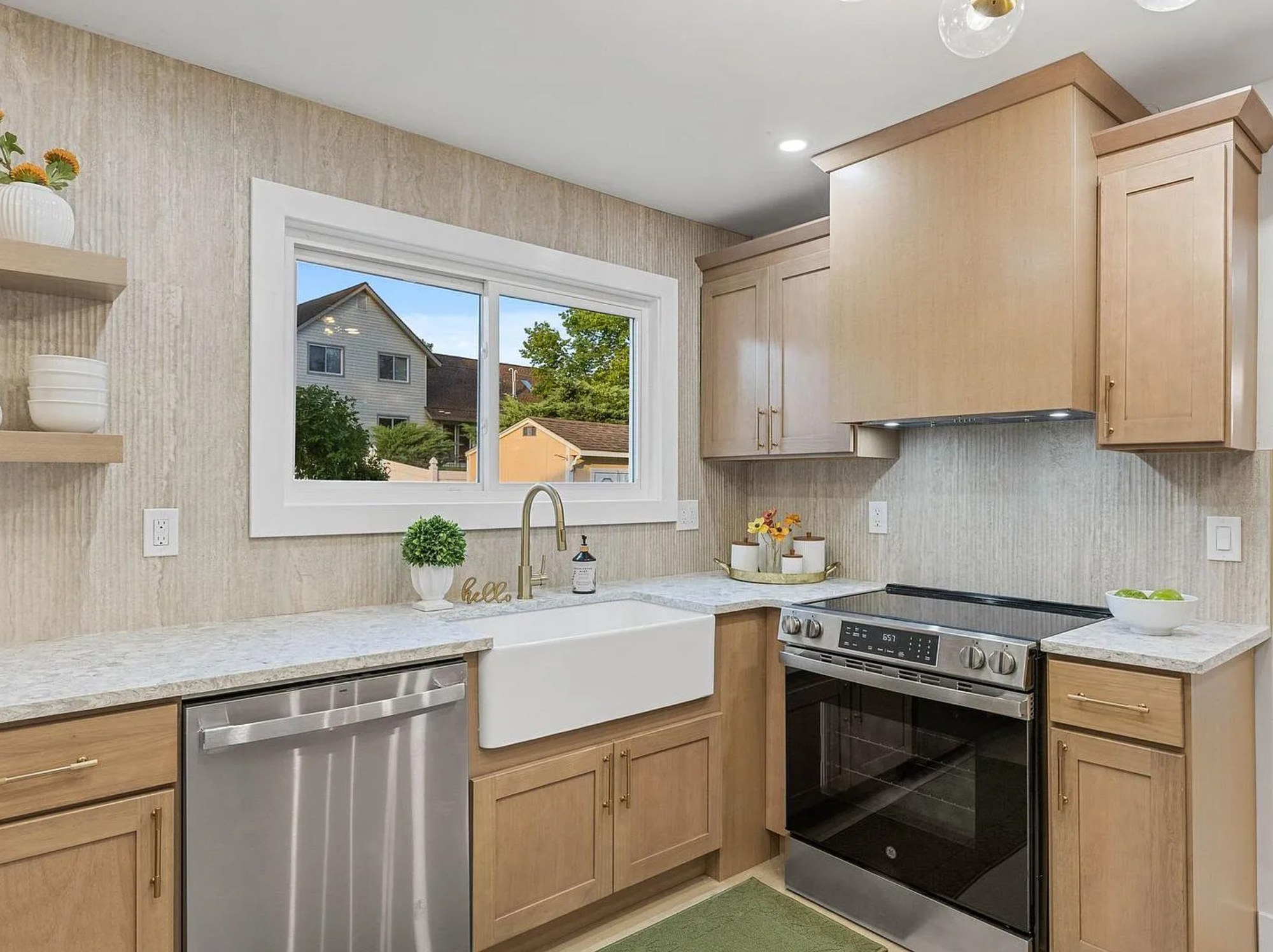 Marlton, NJ resale kitchen with matching hood paneling and farm-style sink cabinet