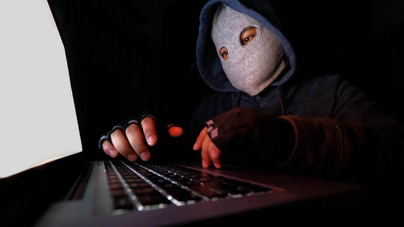 Hacker with a grey masking