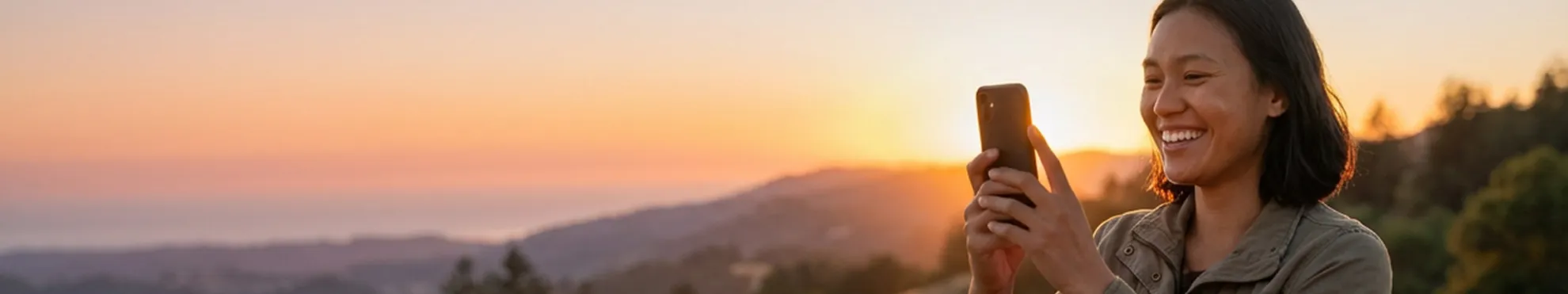 Girl taking photo with phone.