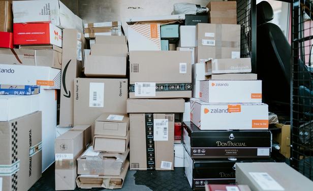packages in a courier delivery van