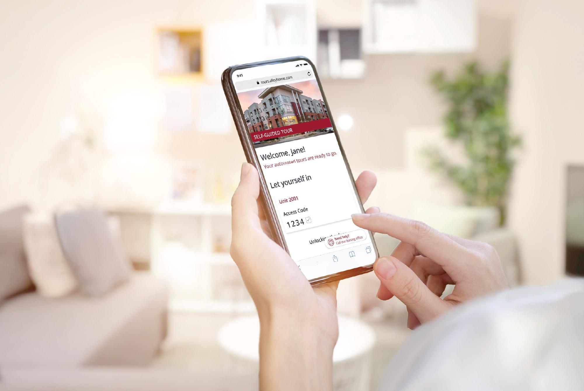 person holding phone with customized branding that available for communities using SmartRent's self-guided tours product