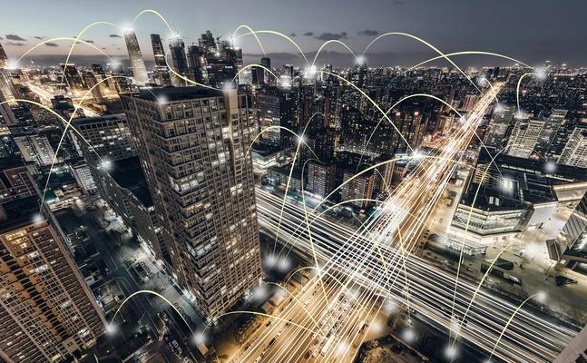 Cityscape at night with light exposure treatment showing connections