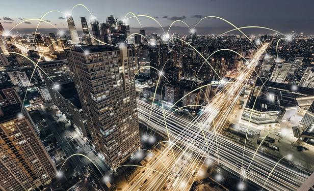 Cityscape at night with light exposure treatment showing connections