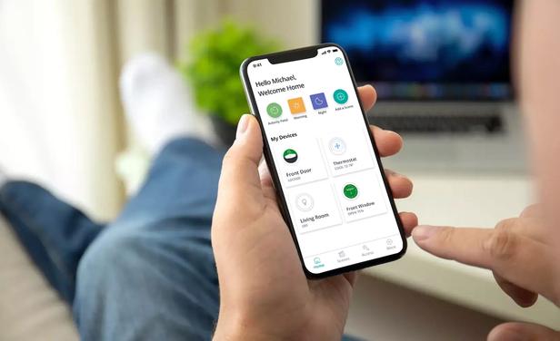 Smartphone owner uses his SmartRent app.