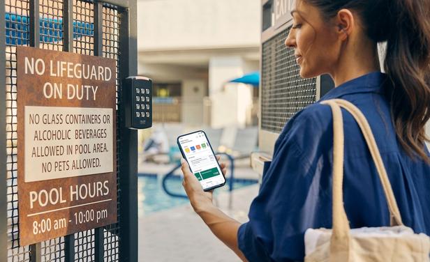 Apartment resident uses SmartRent app to access community pool