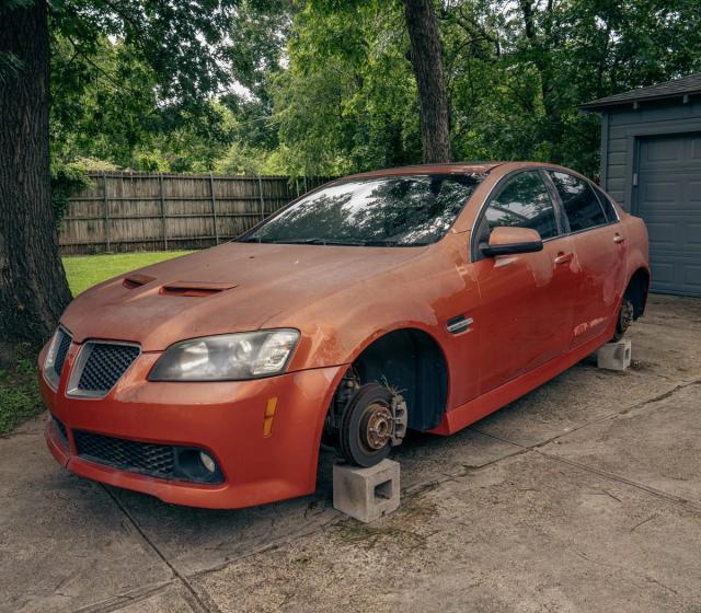 A donated car parked in a driveway