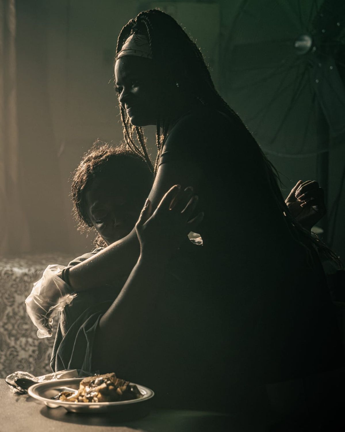 A mother and child sharing a meal